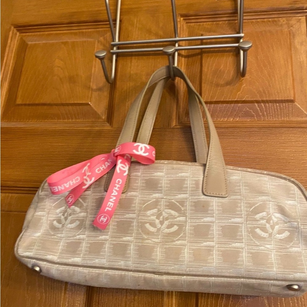 Chanel Beige Shoulder Bag travel line . Pink ribbon not included.